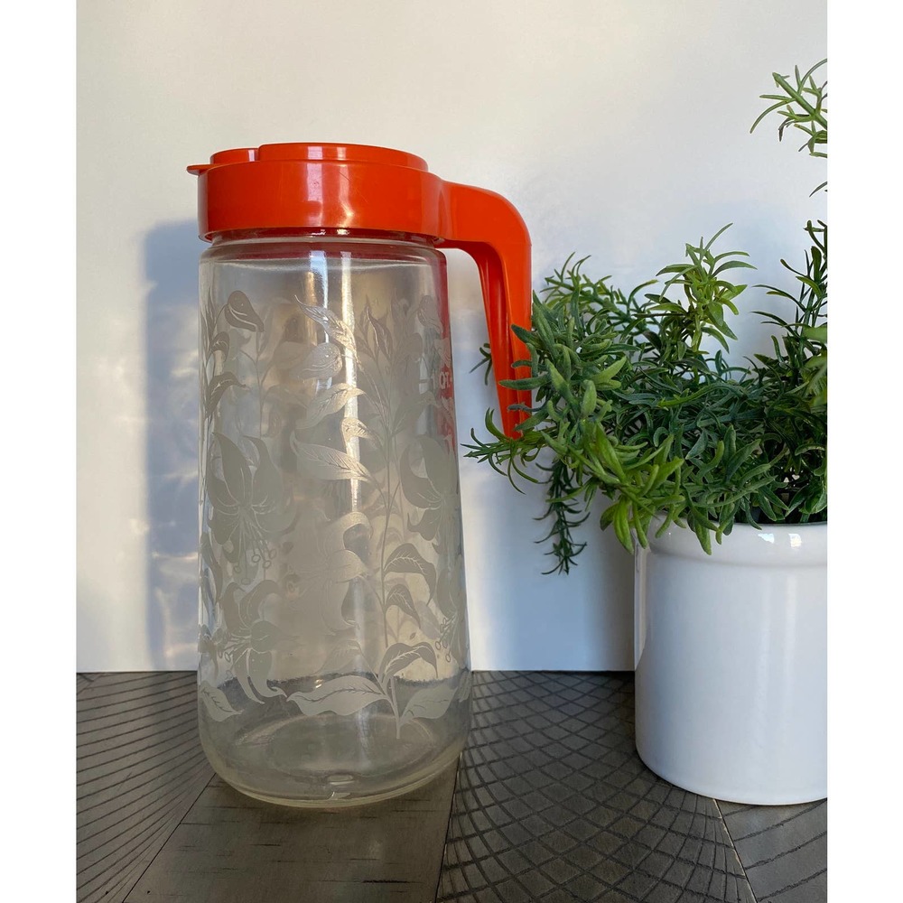 Retro Juice Tang Carafe with Red / Orange Lid and Etched Lilies